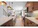 Modern kitchen with stainless steel appliances and breakfast nook at 5604 Kingspan Dr, Charlotte, NC 28217