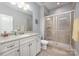 Bathroom with tile flooring and a walk-in shower at 5706 Sardis Hall Ct, Charlotte, NC 28270