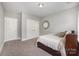 Neutral-toned bedroom with two closets and carpet at 5706 Sardis Hall Ct, Charlotte, NC 28270