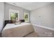 Carpeted bedroom with natural light at 5706 Sardis Hall Ct, Charlotte, NC 28270