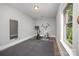 Home gym with exercise equipment and a mirror at 5706 Sardis Hall Ct, Charlotte, NC 28270