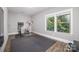 Home gym with exercise equipment and natural light at 5706 Sardis Hall Ct, Charlotte, NC 28270