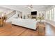 Bright living room with fireplace, built-in shelves and hardwood flooring at 5706 Sardis Hall Ct, Charlotte, NC 28270