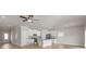 Open-concept space featuring hardwood floors, recessed lighting, and a modern kitchen with stainless steel appliances at 5716 Skinny Dr, Charlotte, NC 28215