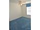 Bedroom features blue carpet, a ceiling fan, and a window with a patterned valance at 648 Dobson Farm Rd, Statesville, NC 28625