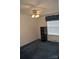 Bright bedroom features a ceiling fan and large window, creating a cozy atmosphere at 648 Dobson Farm Rd, Statesville, NC 28625