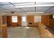Functional garage space with built-in shelving and convenient access to the exterior at 648 Dobson Farm Rd, Statesville, NC 28625