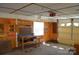 Well-lit garage featuring ample storage and an automatic door opener at 648 Dobson Farm Rd, Statesville, NC 28625