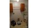 Functional laundry room features tiled floors and white walls at 648 Dobson Farm Rd, Statesville, NC 28625