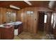 Room with wood paneling featuring a sink and simple features at 648 Dobson Farm Rd, Statesville, NC 28625