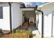 Exterior of the home showing a connecting breezeway and a ramp for accessibility at 648 Dobson Farm Rd, Statesville, NC 28625