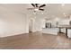 Open floorplan living room and kitchen showcasing modern finishes and ample natural light at 7110 Jerimoth Dr, Charlotte, NC 28215