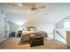 Upper level bedroom with unique ceiling, cozy furnishings, and plentiful lighting at 7215 Meyer Rd, Fort Mill, SC 29715