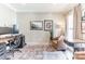 Comfortable home office space, featuring natural light, neutral decor and hardwood flooring at 7215 Meyer Rd, Fort Mill, SC 29715