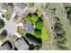 Aerial view showing the property lines, house orientation, and outdoor spaces, backing to a treed area at 722 Sandy Green Ct, Fort Mill, SC 29715