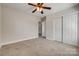 Bedroom with neutral walls, carpeted floors, a ceiling fan and a closet for storage at 722 Sandy Green Ct, Fort Mill, SC 29715