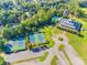 Aerial shot of community amenities including tennis courts, swimming pool, recreation center, and ample parking at 722 Sandy Green Ct, Fort Mill, SC 29715