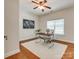 Bright office space features a stylish desk, neutral rug, and natural light from a window at 722 Sandy Green Ct, Fort Mill, SC 29715