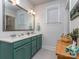 Bathroom with double sink vanity, great lighting, and a large mirror at 815 Digby Rd, Rock Hill, SC 29730