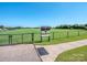 An outdoor field with lush green grass surrounded by a black fence at 815 Digby Rd, Rock Hill, SC 29730