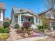 Stylish home with landscaped front yard, rock garden, attractive shrubs and a welcoming covered porch at 815 Digby Rd, Rock Hill, SC 29730