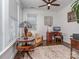 Functional home office with a cozy armchair, area rug, and a well-lit workspace at 815 Digby Rd, Rock Hill, SC 29730