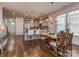 Open concept kitchen and dining area features stainless appliances, bar seating and hardwood floors at 815 Digby Rd, Rock Hill, SC 29730