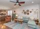 Open concept living room featuring hardwood floors, a ceiling fan and lots of natural light at 815 Digby Rd, Rock Hill, SC 29730