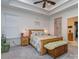 The main bedroom features a tray ceiling, carpeted floors and a wooden bed frame at 815 Digby Rd, Rock Hill, SC 29730