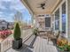 Cozy porch with comfortable seating, potted plants, and ceiling fan for outdoor enjoyment at 815 Digby Rd, Rock Hill, SC 29730