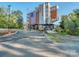 Unique building featuring an American flag with modern architecture and ample parking space at 815 Digby Rd, Rock Hill, SC 29730