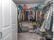 Organized walk-in closet with ample shelving, rods, and storage solutions for clothing and accessories at 815 Digby Rd, Rock Hill, SC 29730