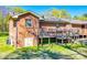 Multi-level wooden deck offers a charming space for relaxing or entertaining outdoors at 970 Willowbrook Ave, Rock Hill, SC 29730