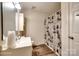 Clean bathroom with a white vanity and decorative shower curtain at 970 Willowbrook Ave, Rock Hill, SC 29730