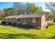 Charming brick home with well-maintained landscaping and a welcoming front entrance at 970 Willowbrook Ave, Rock Hill, SC 29730
