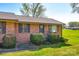 Charming single-story brick home with a well-maintained lawn and traditional landscaping at 970 Willowbrook Ave, Rock Hill, SC 29730