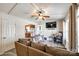 Cozy living room featuring a comfortable sofa, ceiling fan, and view into the adjacent kitchen at 970 Willowbrook Ave, Rock Hill, SC 29730