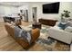 Open living area seamlessly connects to a modern kitchen, perfect for entertaining guests at 1022 Johnna Ln, Indian Land, SC 29707