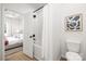 Bathroom features a shower-tub combination, white subway tile, and modern fixtures, connecting to the bedroom at 1026 Dooley Dr, Charlotte, NC 28227