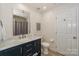 Bathroom with a modern vanity, commode, and shower/tub combo at 104 Pier 33 Dr # 308, Mooresville, NC 28117