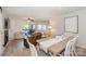 Bright and open dining space with a view of the living room and balcony, perfect for entertaining at 104 Pier 33 Dr # 308, Mooresville, NC 28117