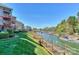 Scenic waterfront view with a wooden boardwalk and boat docks, set against a clear blue sky at 104 Pier 33 Dr # 308, Mooresville, NC 28117