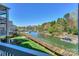 Waterfront view from a condo showing a wooden boardwalk and boat slips at 104 Pier 33 Dr # 308, Mooresville, NC 28117