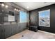 Modern bathroom featuring a glass shower, gray tile, and a double sink vanity at 10914 Zac Hill Rd, Davidson, NC 28036