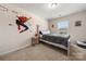 Bedroom with natural light, carpet and Spiderman wall art at 10914 Zac Hill Rd, Davidson, NC 28036