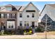 Charming townhome with a well-maintained front yard and inviting entrance, showcasing curb appeal at 10914 Zac Hill Rd, Davidson, NC 28036