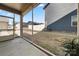 View of the open yard from the screened porch featuring a concrete floor and a partial view of the neighboring home at 10914 Zac Hill Rd, Davidson, NC 28036