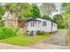 Charming bungalow with black and white trim, front porch, and driveway at 110 Steele St # 34 35, Fort Mill, SC 29715