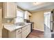 A modern kitchen with white countertops and cabinetry with updated appliances at 110 Steele St # 34 35, Fort Mill, SC 29715