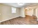 Inviting living room with hardwood floors, neutral walls, and natural light from the window at 110 Steele St # 34 35, Fort Mill, SC 29715